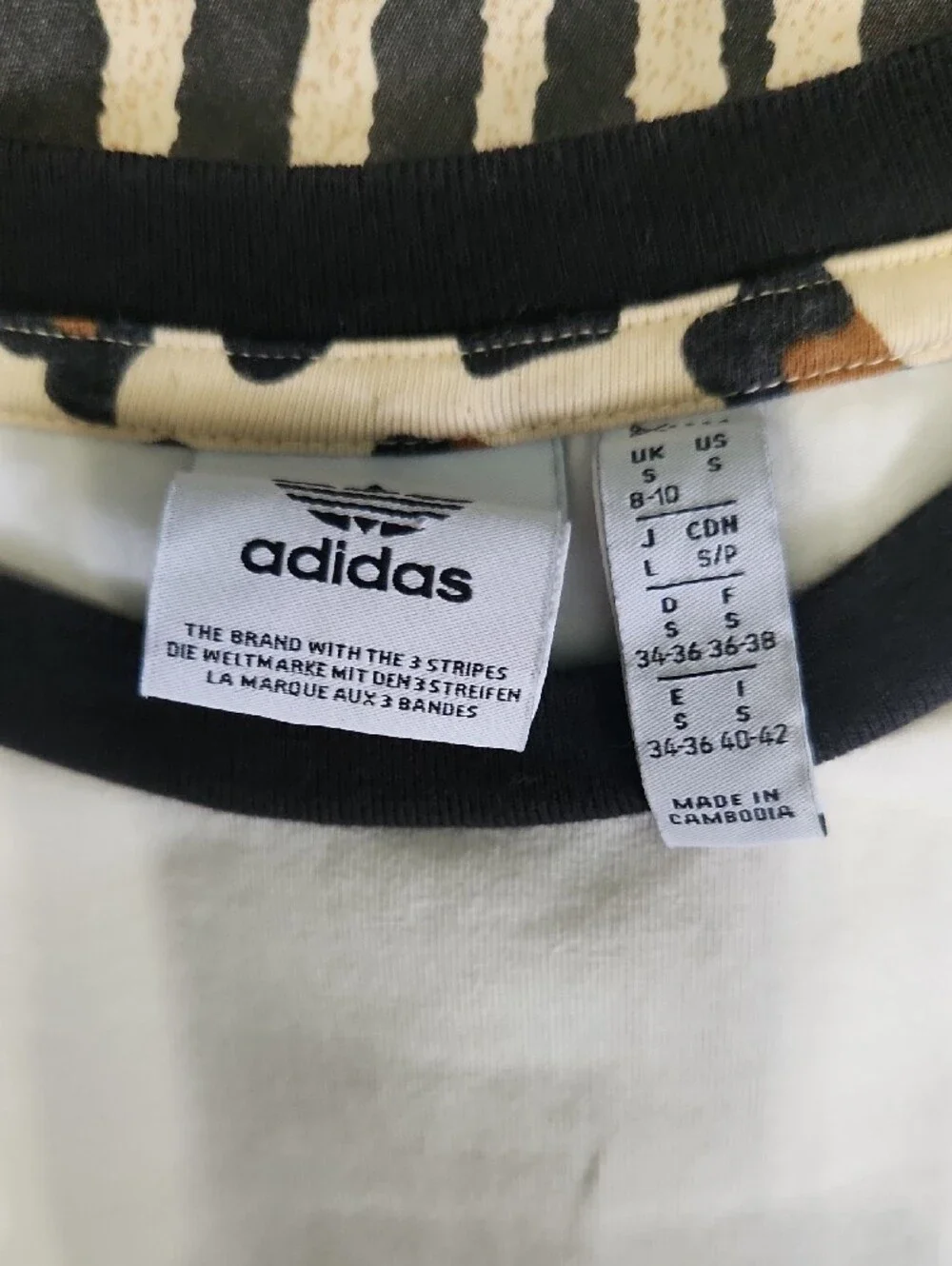 adidas White Short Sleeve Tee with Leopard Shoulder Stripes. Girl's Lg